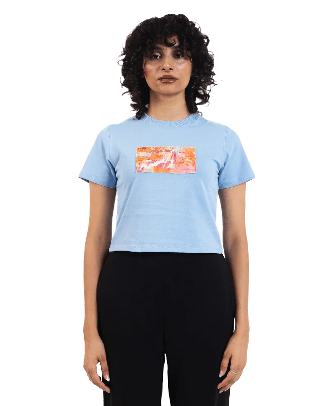 "Radiant Horizon" Baby Blue Crop Top Asymmetrical Pockets Print